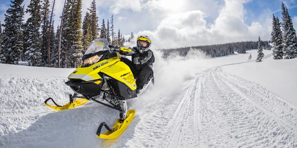 Explore the many miles of groomed snowmobile trails Old and Inlet